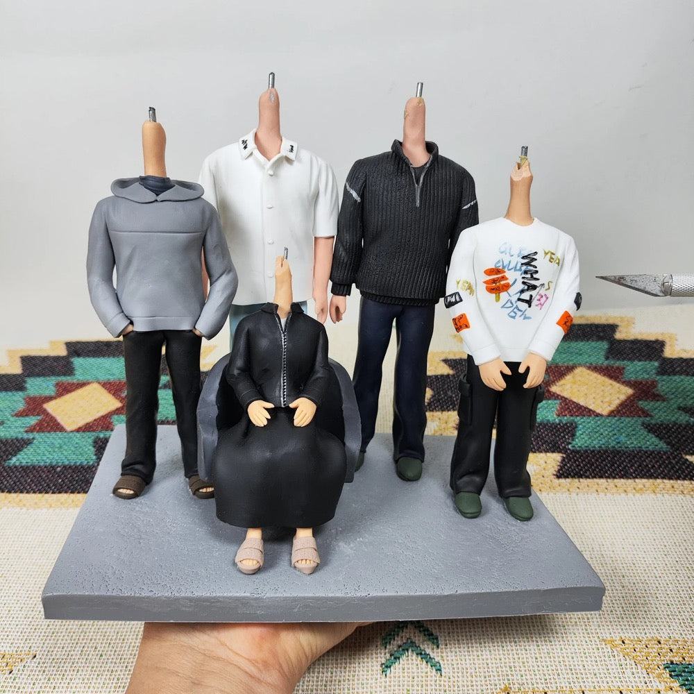 Figures wearing various outfits on a gray platform with a patterned rug in the background
