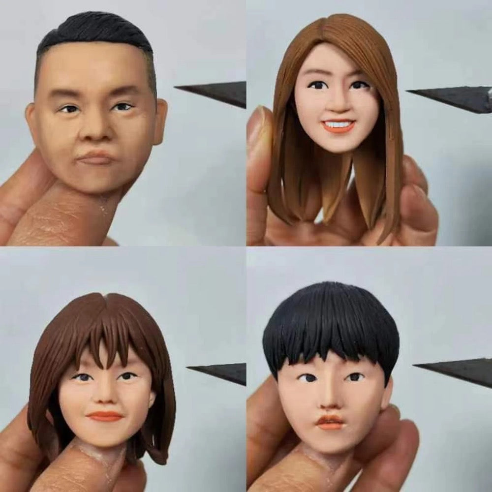 Four small figurines of people with different hairstyles held by fingers against a light gray background.