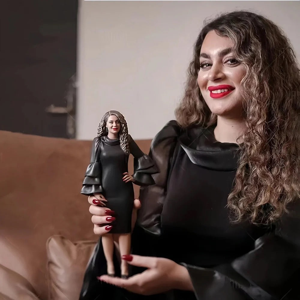 Woman holding a custom action  figure with a similar outfit, sitting on a couch.