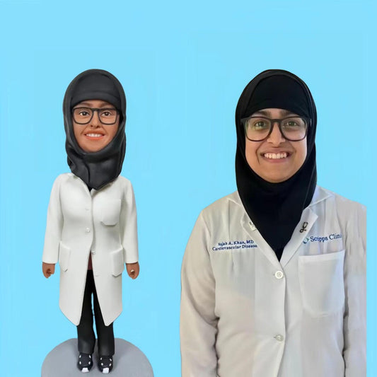 Custom female doctor bobblehead doll featuring a woman in a white coat and hijab, personalized gift for healthcare professionals.