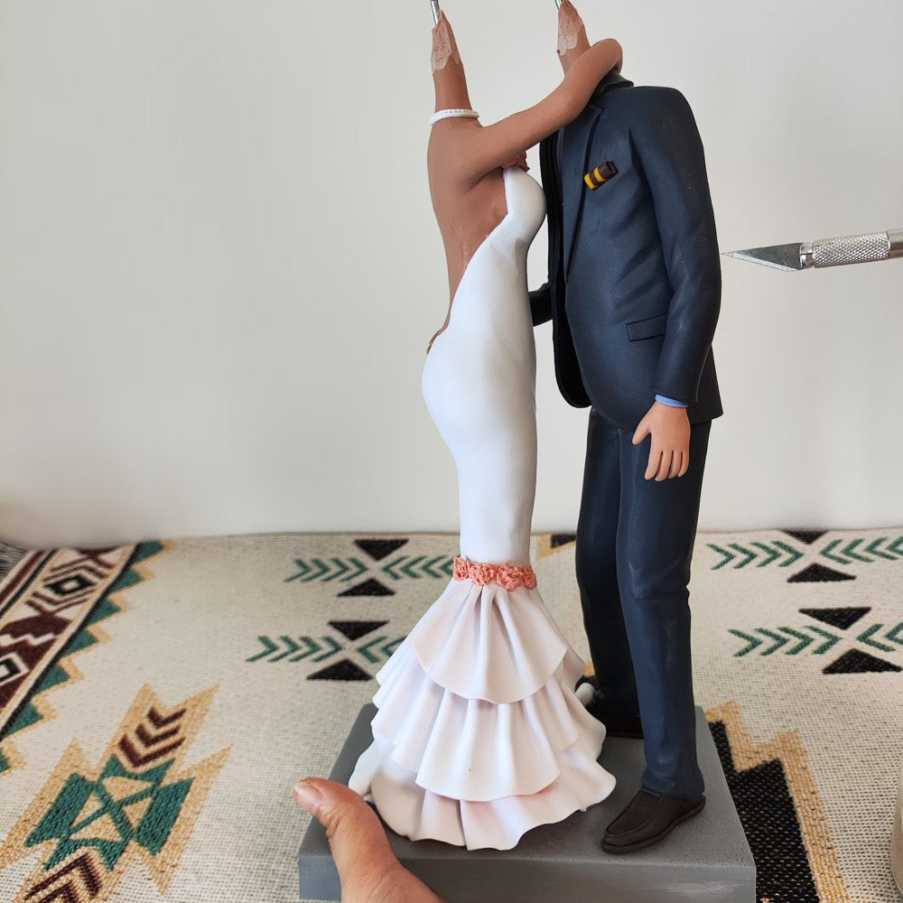 Custom couple bobblehead wedding outfit details with bride dress and groom suit