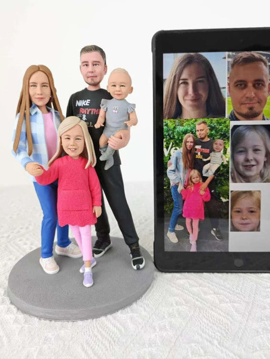 Family figurine next to a tablet displaying a video call with family members.
